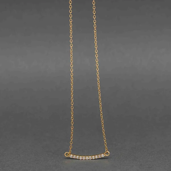 elicate gold bar necklace with diamond accents
