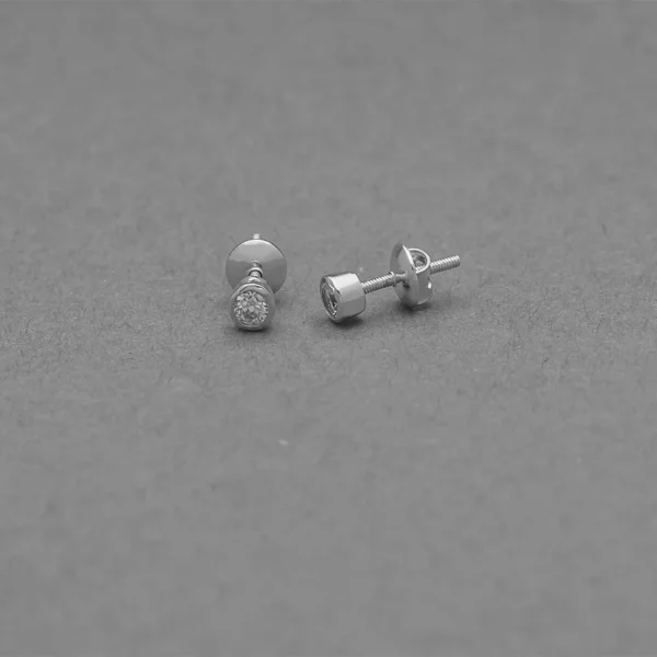 Diamond stud earrings in white metal