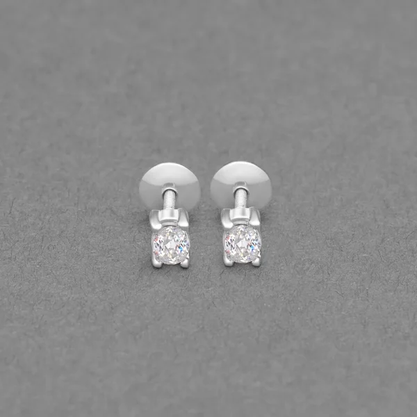 Round diamond stud earrings in white metal