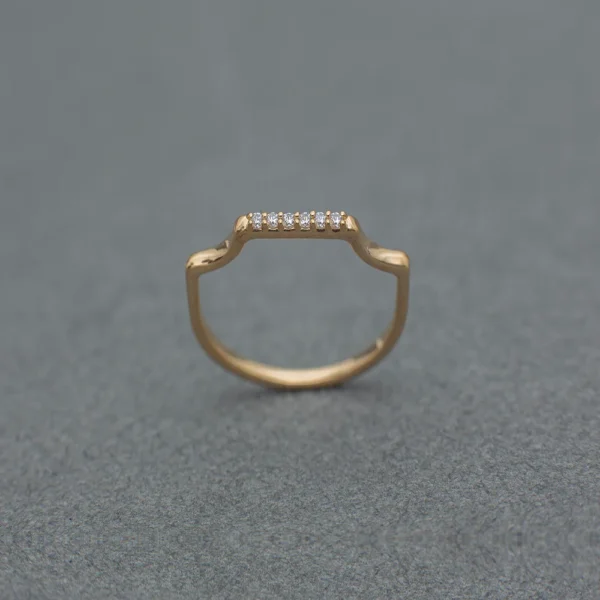 CAD-engineered gold jewelry sample by Karma; a custom-manufactured ring with a unique squared crown and brilliant-cut diamond accents, showcasing B2B jewelry production quality.