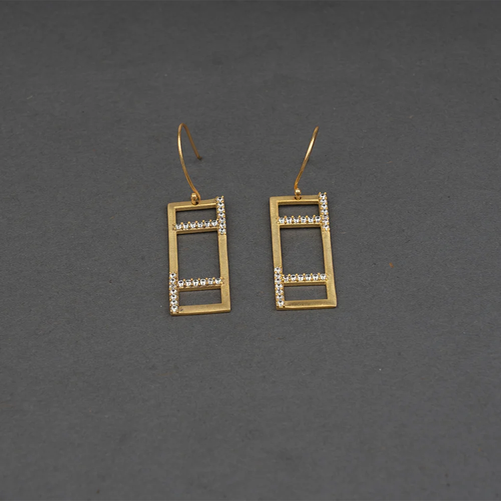Gold geometric drop earrings with stones