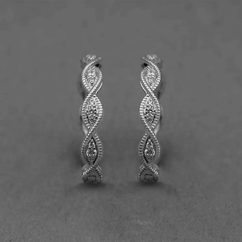 Silver twisted infinity earrings with Diamonds