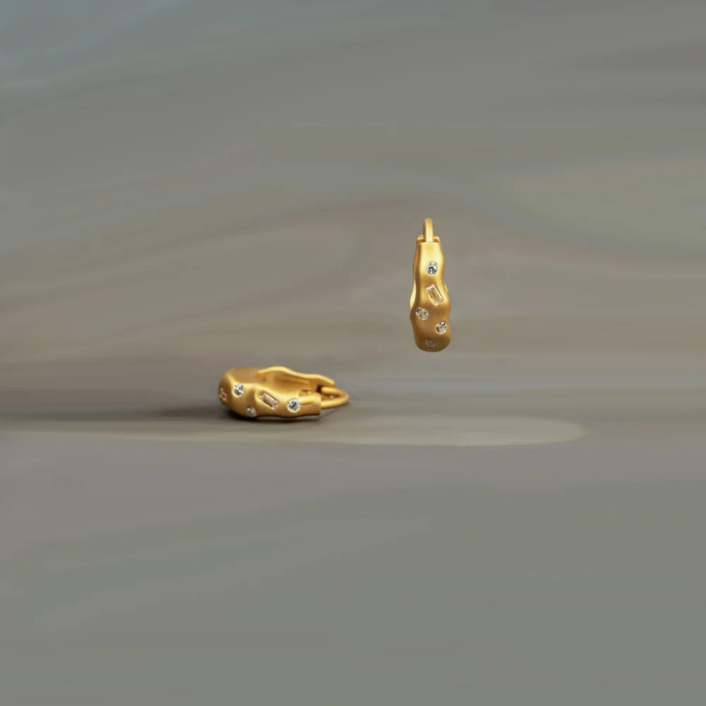 Organic gold earring with studded lab grown diamonds