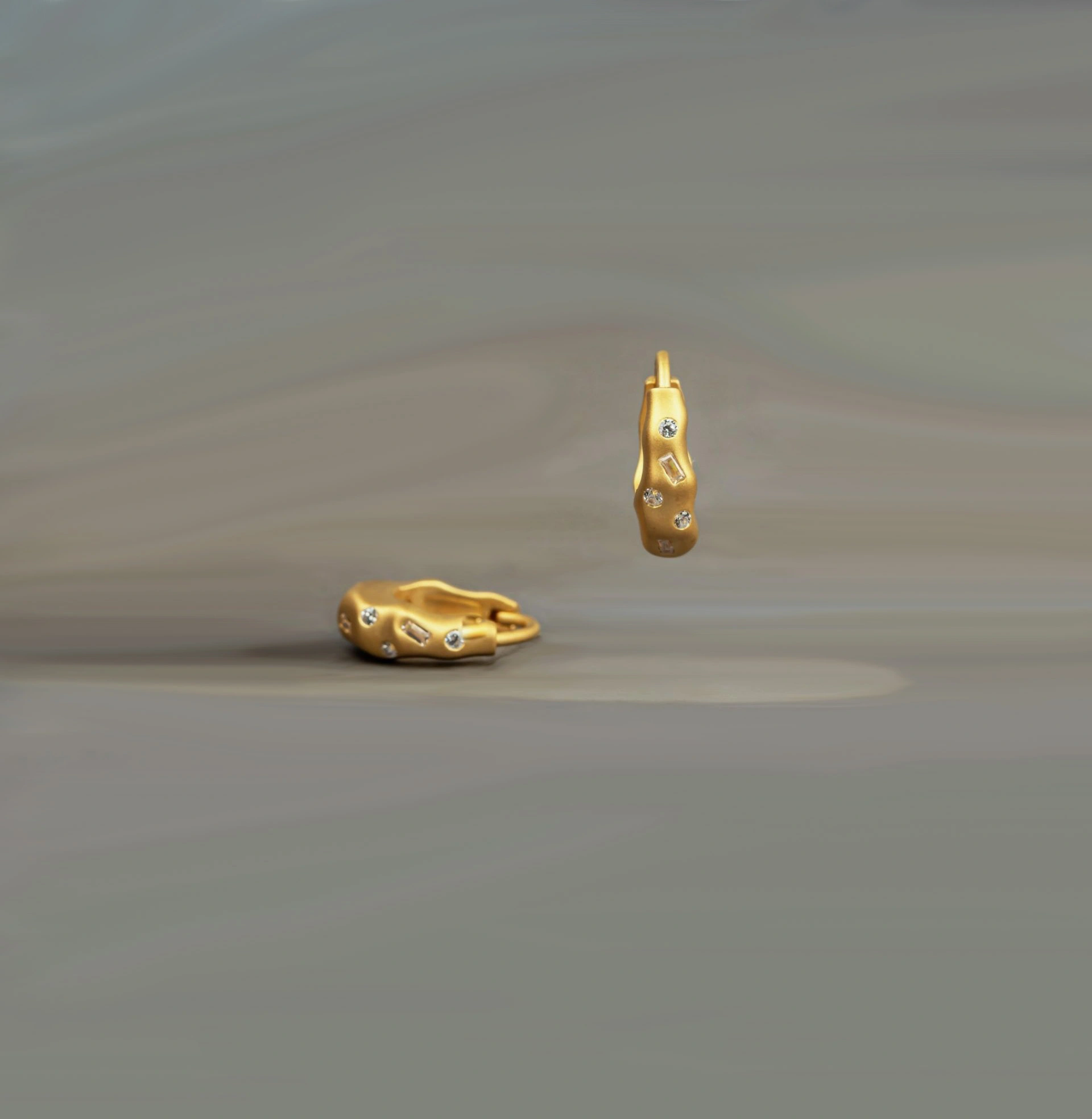 Organic gold earring with studded lab grown diamonds