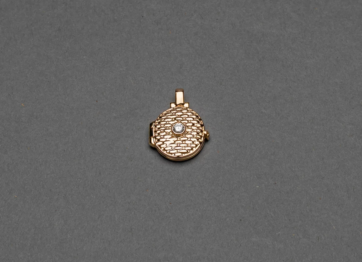 Gold pendant with diamond setting, elegant fine jewelry piece for women from Karma Designs collection, perfect for everyday luxury