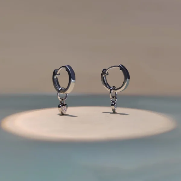 Lab grown diamond heart charm huggie earrings in sterling silver minimal design