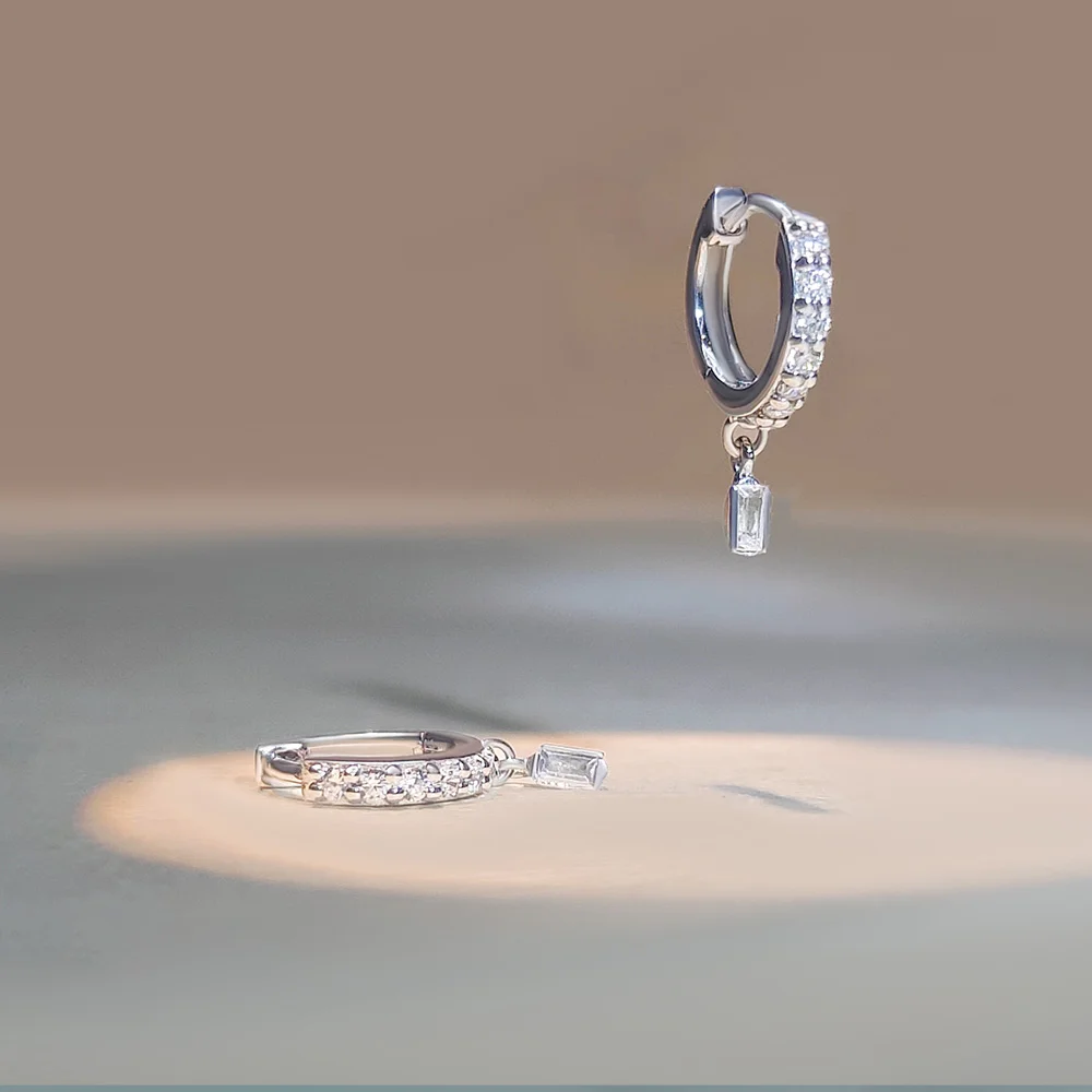 Sterling silver pavé huggie earrings with baguette lab grown diamond drop
