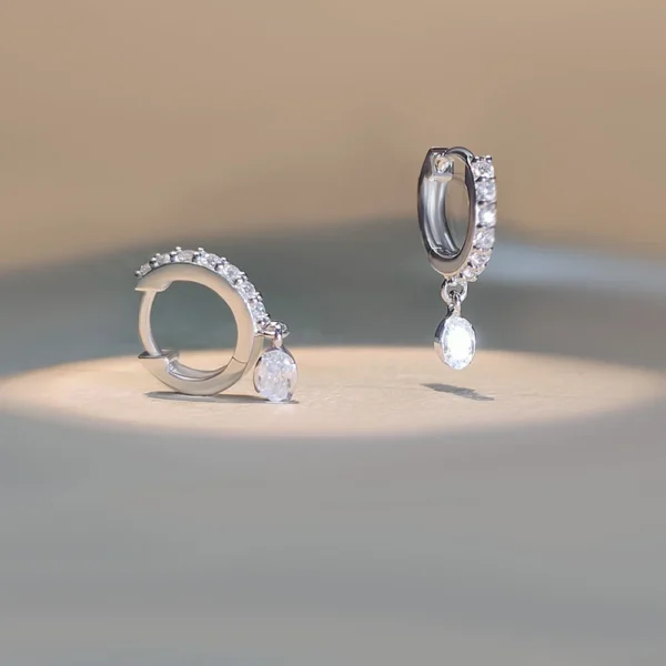 KE ER 14689 sc Sterling silver lab grown diamond huggie hoop earrings with dangling oval diamond charm